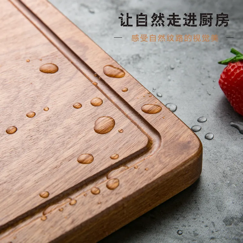 Tabla de cortar rectangular de madera de &eacute;bano con ranura para jugo 