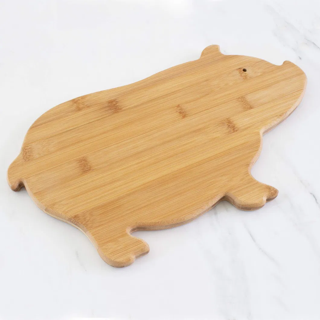 Adorable tabla para cortar frutas de bamb&uacute; con forma de 