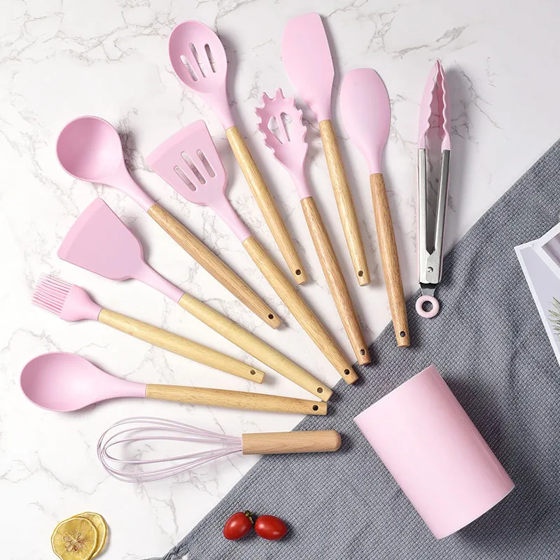 Venta al por mayor de utensilios de cocina de silicona personalizados con mango de madera para cocinar 