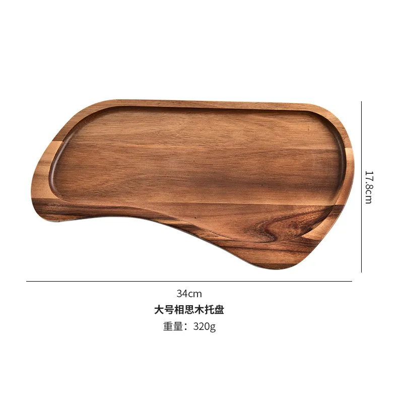 Elegante juego de platos llanos de madera de acacia para un comedor moderno