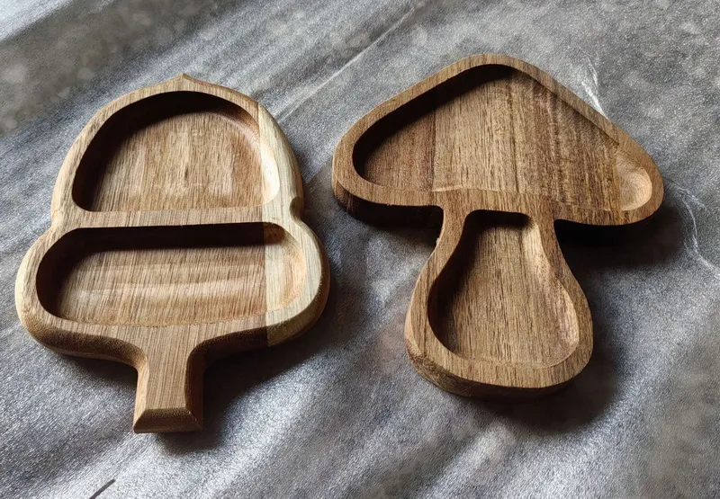 Elegantes platos para servir de madera de acacia con forma de