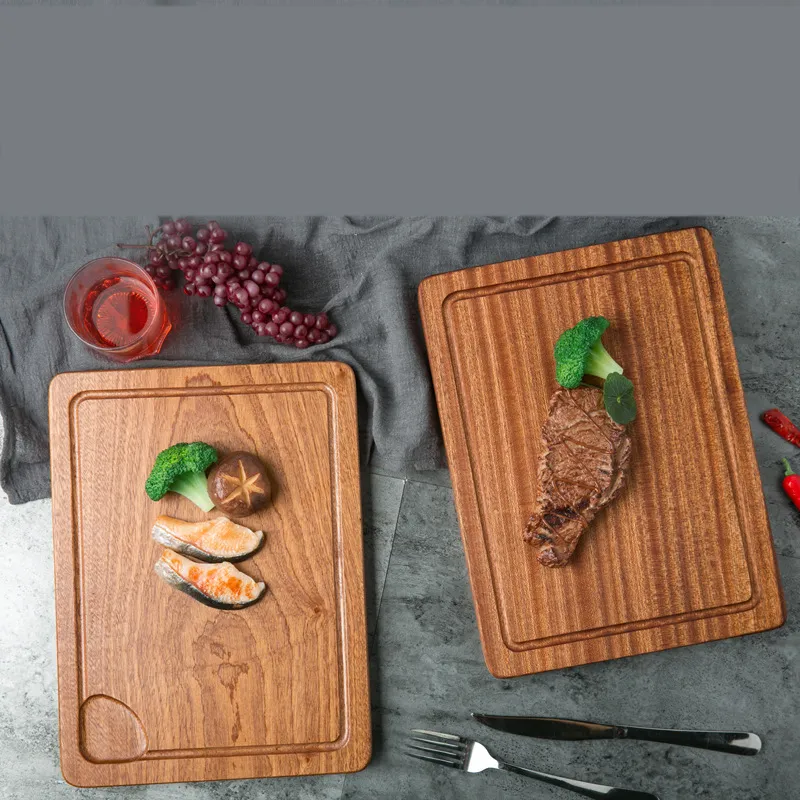 Tabla de cortar rectangular de madera de &eacute;bano con ranura para jugo 