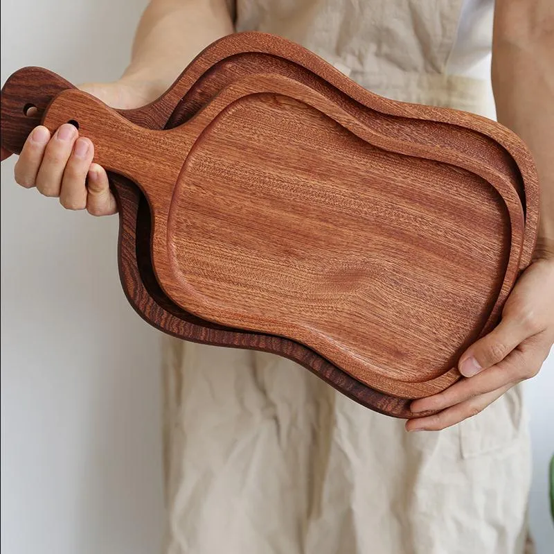 Venta al por mayor Bandeja para servir de madera de &eacute;bano con forma de paleta con mango 